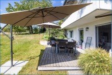 GG-Blick auf Terrasse und Wohnung Attraktives Dreifamilienhaus mit zwei Doppelgaragen und umfassender Modernisierung als Renditeobjekt