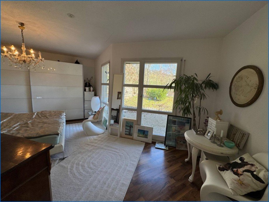 Schlafzimmer mit Gartenzugang Einfamilienhaus M�hlingen / Zoznegg