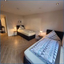 Schlafzimmer 2 FEWO-Zulassung: 
Gro�z�gige 3,5 Zimmer EG-Wohnung mit Terrasse und Stellplatz - sehr hohe Rendite!