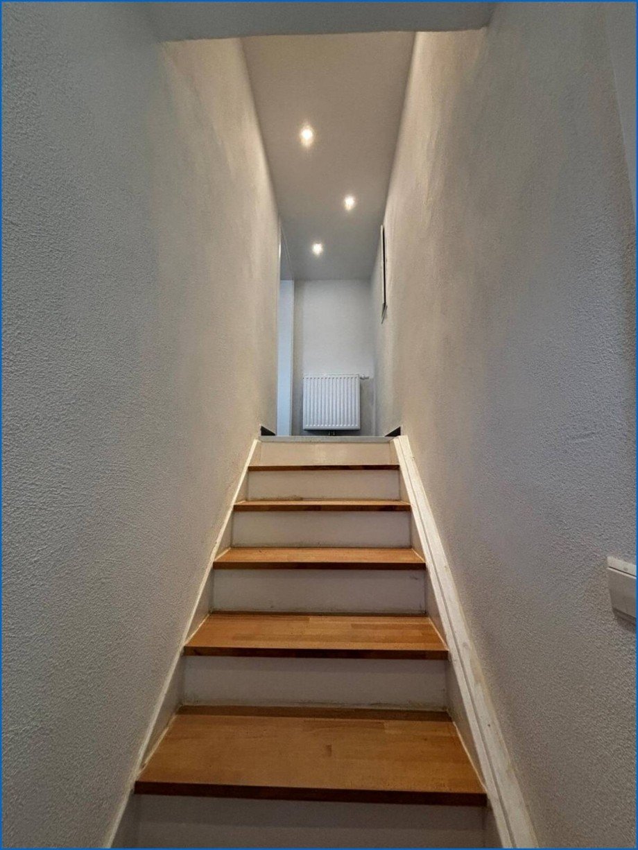 Treppe zum G�ste WC Zweifamilienhaus M�hlingen / Zoznegg