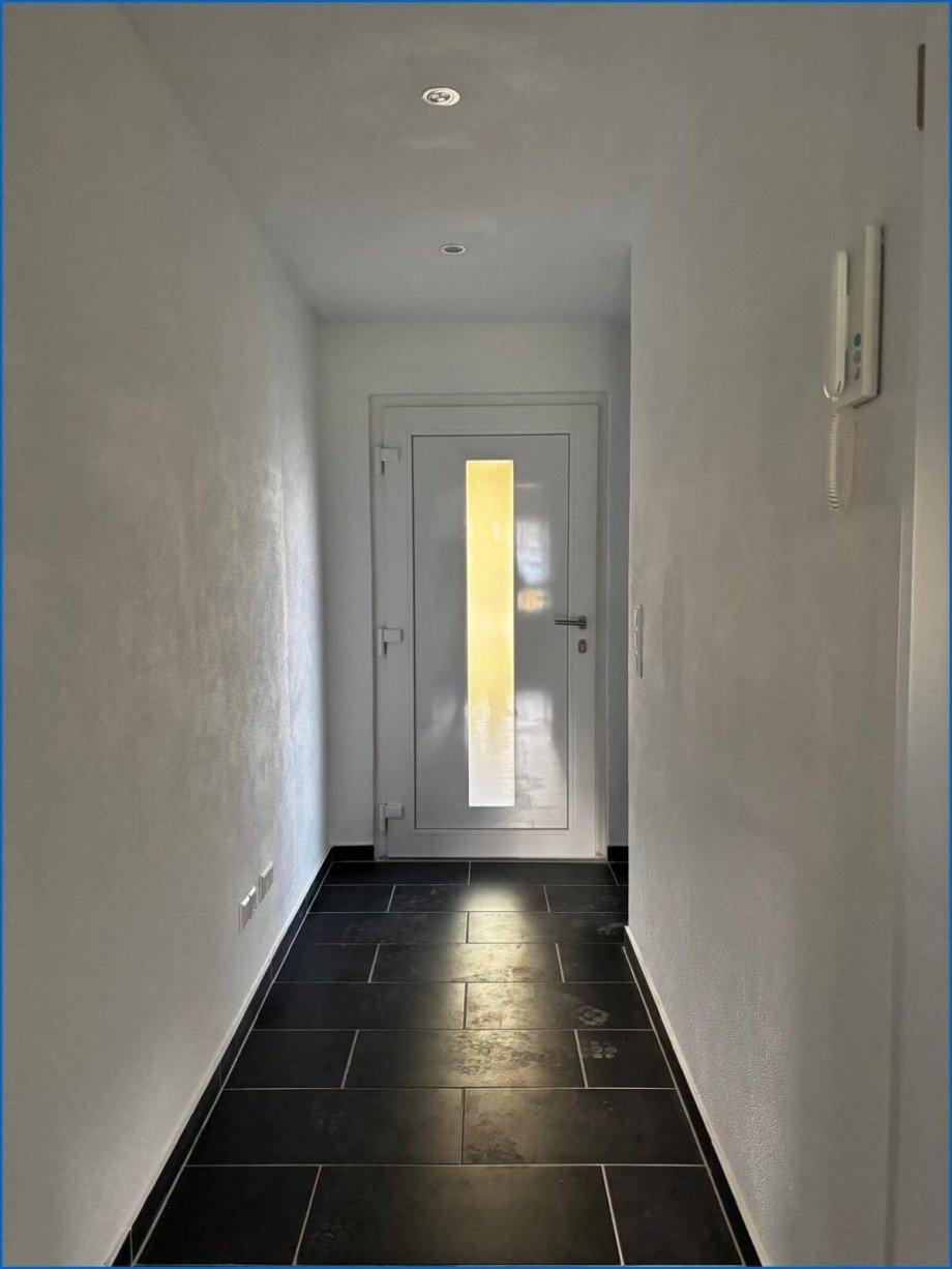 Flur und Haust�r Zweifamilienhaus M�hlingen / Zoznegg