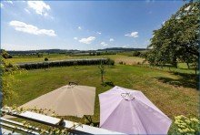 EG_Ausblick vom Balkon Attraktives Dreifamilienhaus mit zwei Doppelgaragen und umfassender Modernisierung als Renditeobjekt