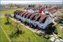 Luftbild 1 RZ-B�hringen: noch Vermietetes Reihenmittelhaus m. Carport, in ruhiger u. kinderfreundlicher Lage!