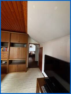 Wohnzimmer Dachgeschosswohnung �hningen / Schienen