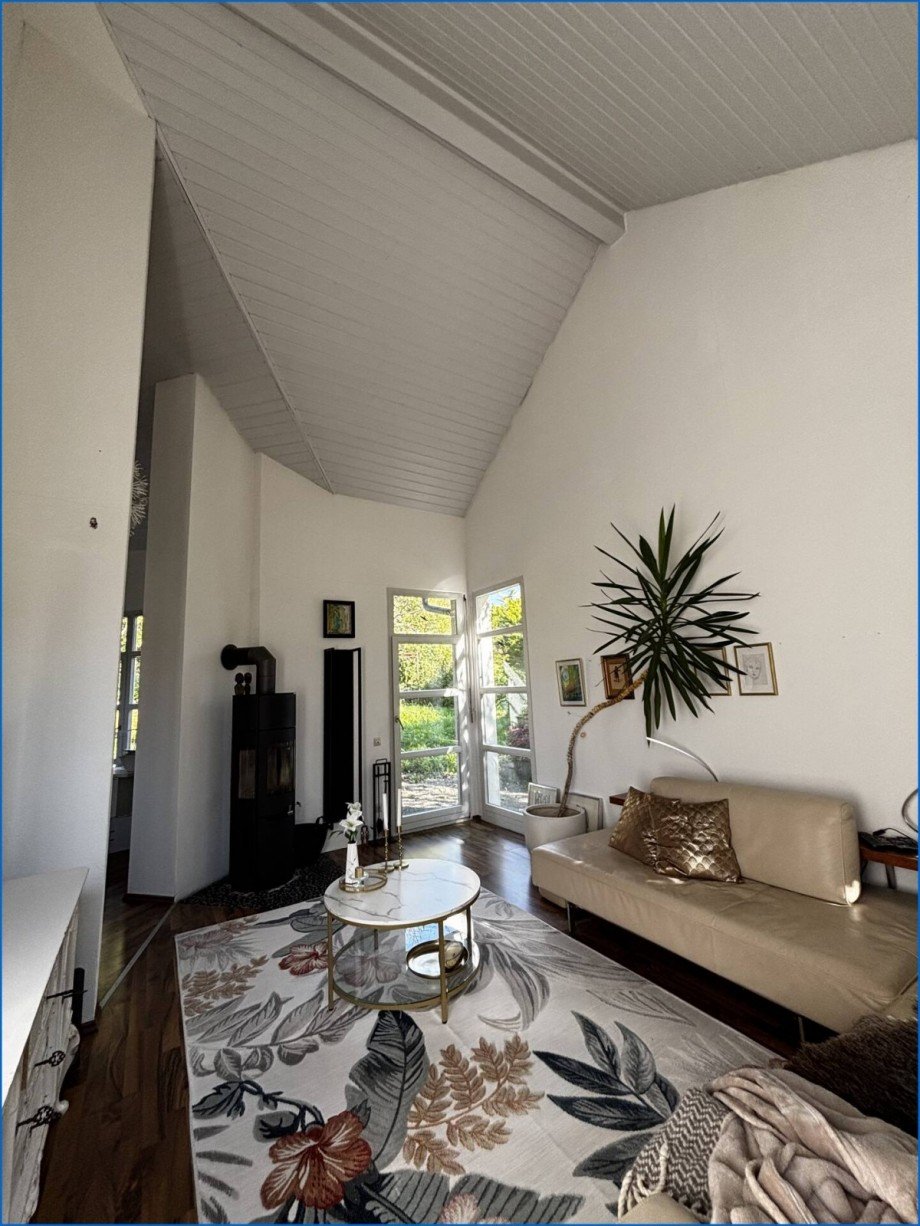 Wohnzimmer mit Schwedenofen Einfamilienhaus M�hlingen / Zoznegg