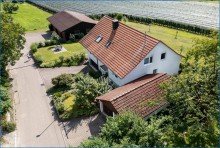Ansicht  von oben mit Garage Attraktives Dreifamilienhaus mit zwei Doppelgaragen und umfassender Modernisierung als Renditeobjekt