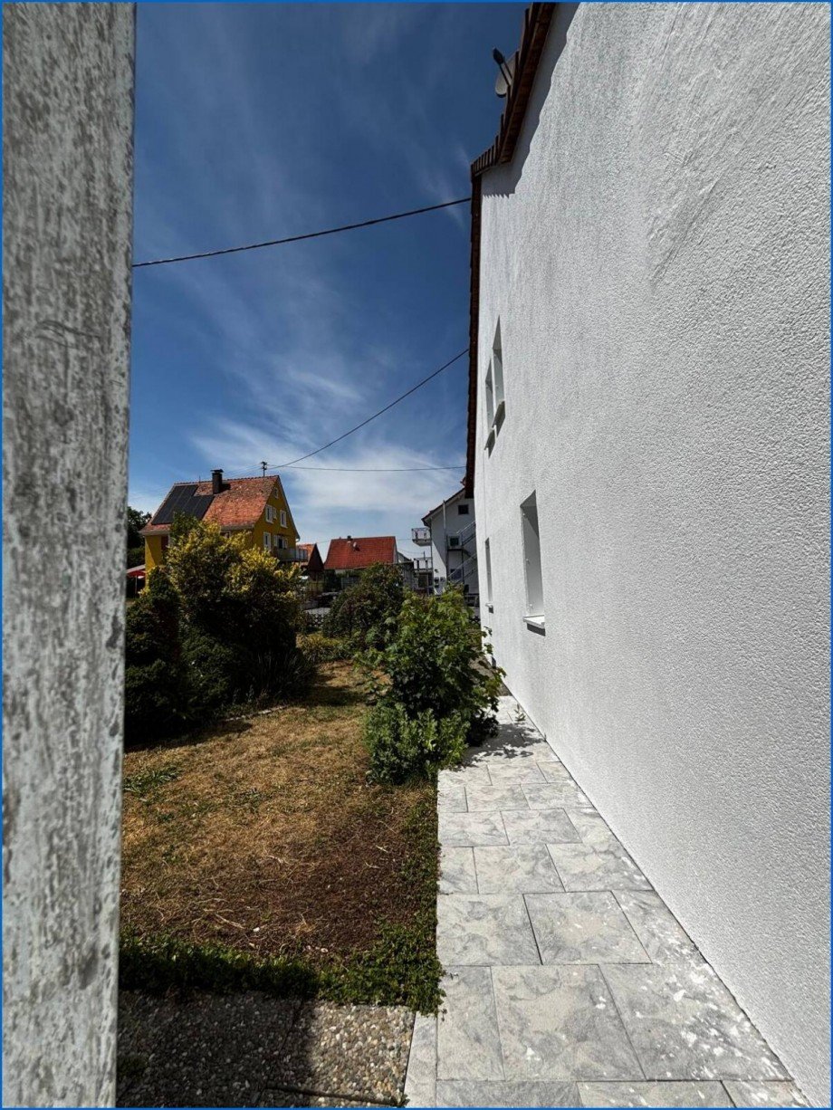 Seitlicher Gartenanteil Etagenwohnung M�hlingen / Zoznegg