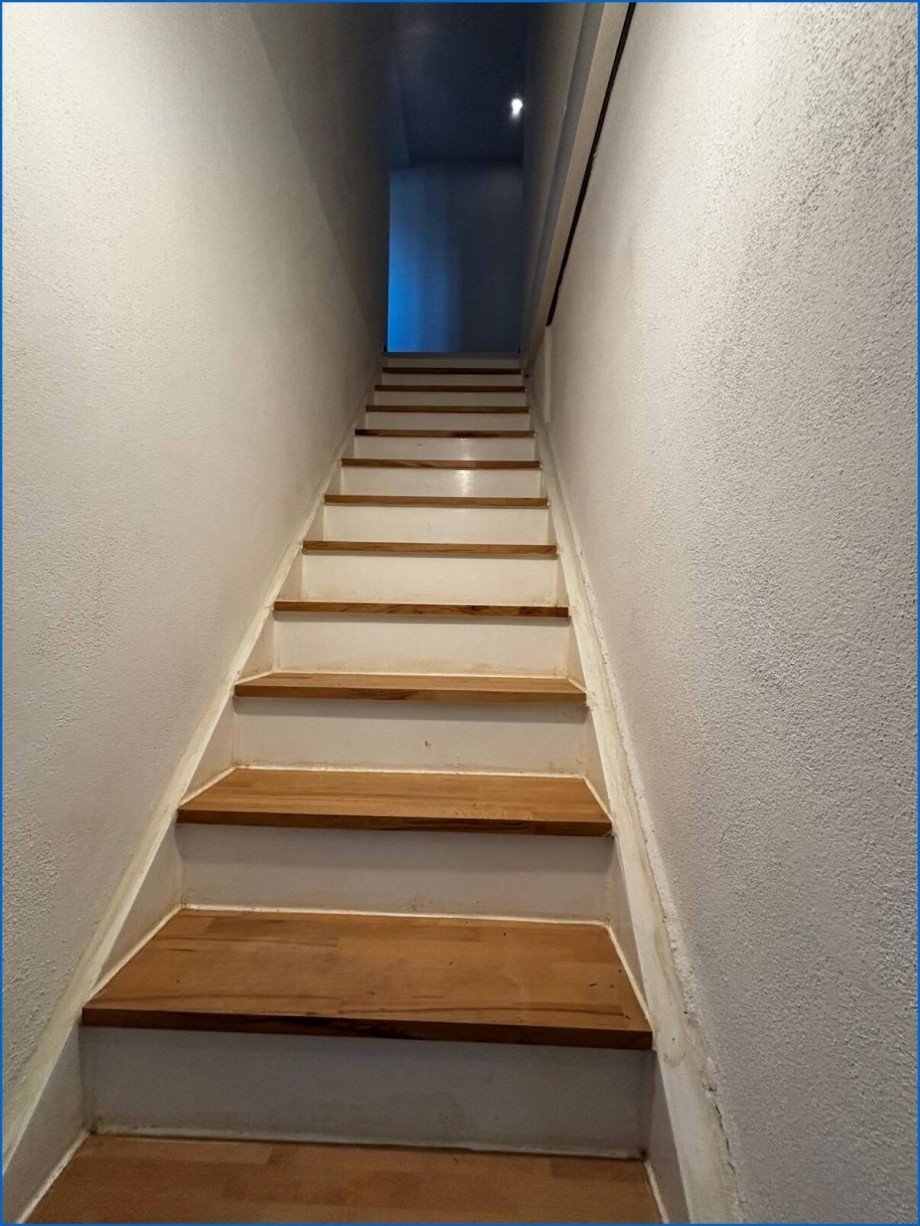 Treppe zm 1.Obergeschoss Zweifamilienhaus M�hlingen / Zoznegg