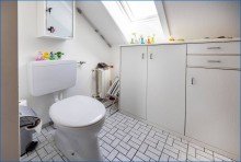 DG-WC Attraktives Dreifamilienhaus mit zwei Doppelgaragen und umfassender Modernisierung als Renditeobjekt